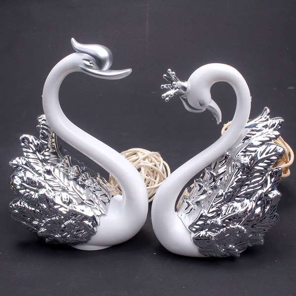 Golden silver swan with crown