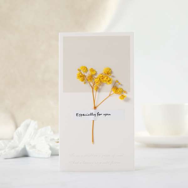 Dry flower with card
