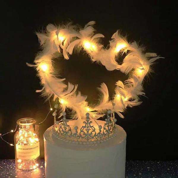 Feather with light topper