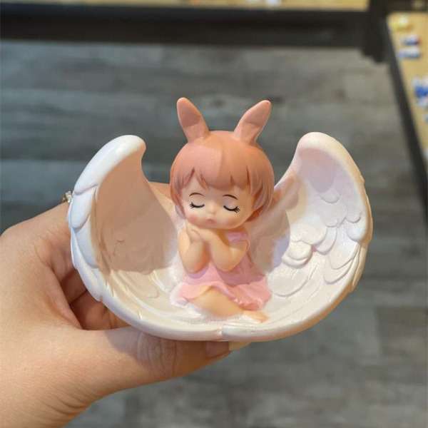 Cute angel doll with wings